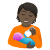 🧑🏿‍🍼 person feeding baby: dark skin tone display on JoyPixels